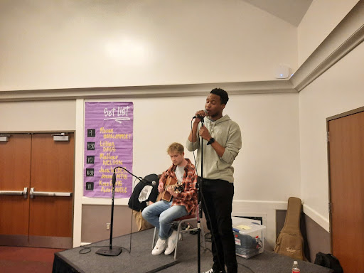 Jordan Mtui and Jack Weber performing on the stage at Art After Dark.