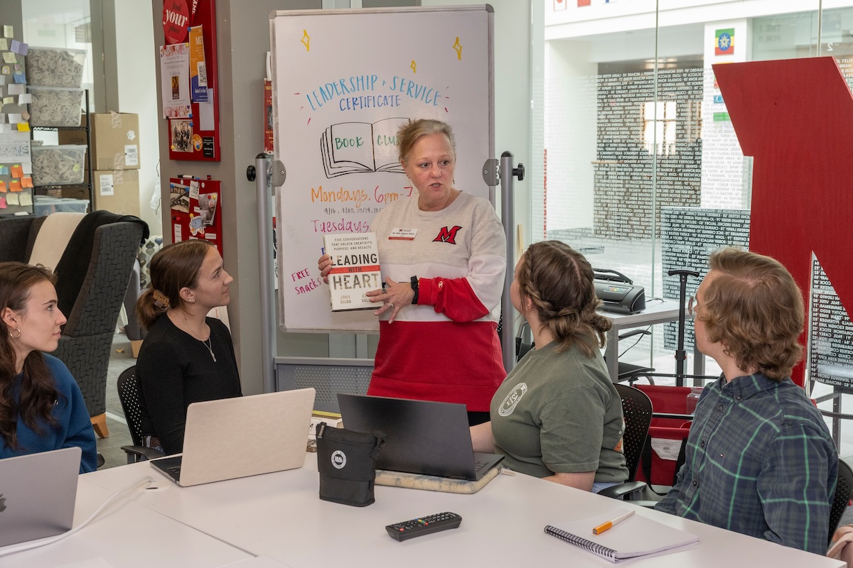 Kim Vance giving talking to a group of students about leadership.