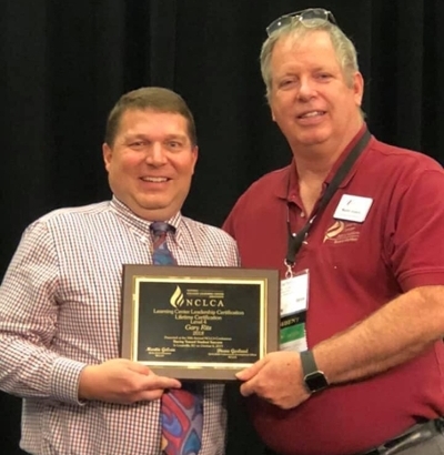 Gary Ritz receiving the Lifetime Learning Center Leadership Certification.