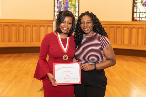 Angela Sargent with award, with sister Amanda Sargent