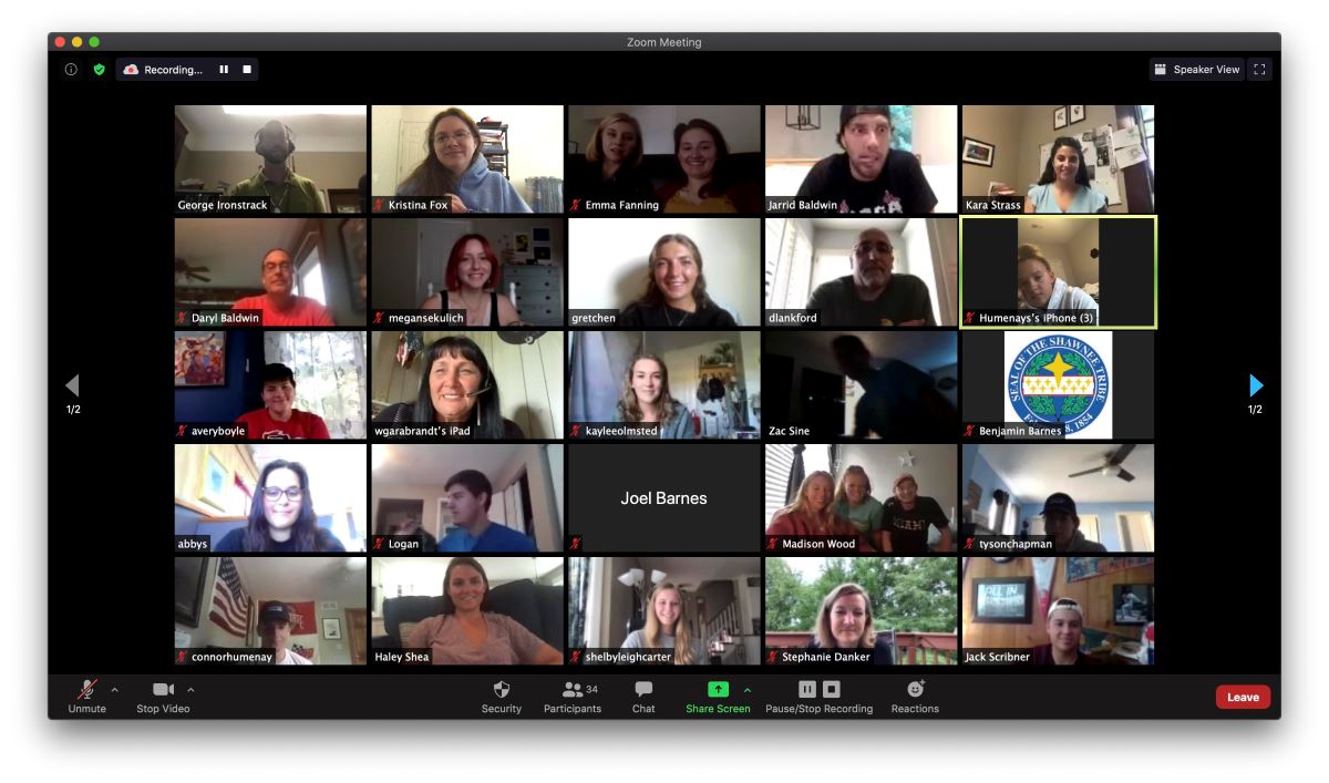A screenshot of a virtual meeting with many people.