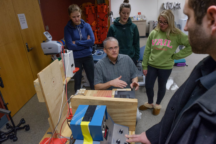 Bill Berg and undergraduate students