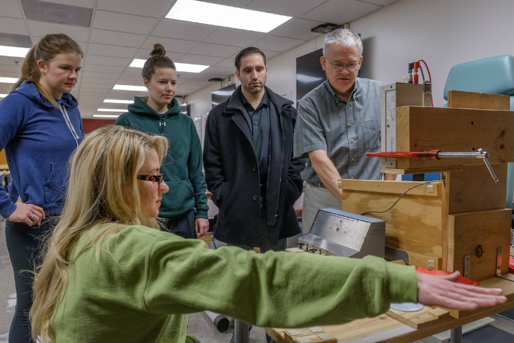 Bill Berg and undergraduate students