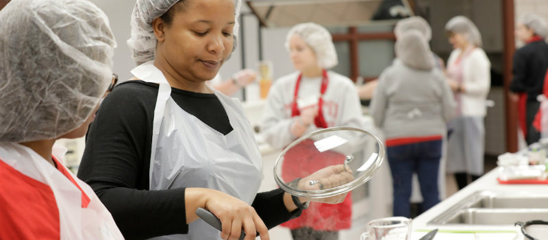 Students working in a kitchen classroom