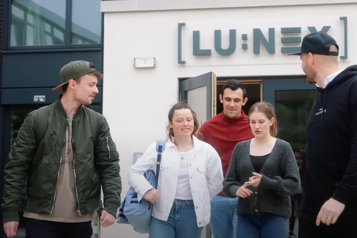 students in front of Lunex