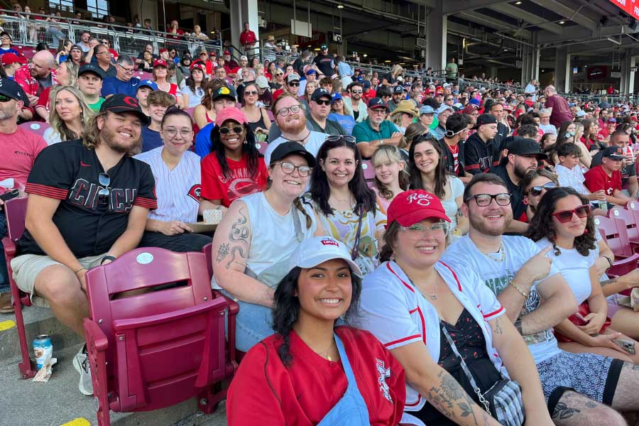 Kenzie Andrews with the the Miami Early Career Teacher group at a Cincinnati Reds game