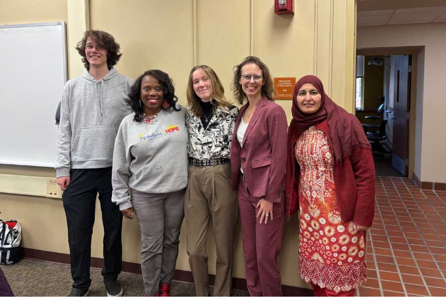 A few of the student attendees along with guest speaker and author Sarah Stitzlein