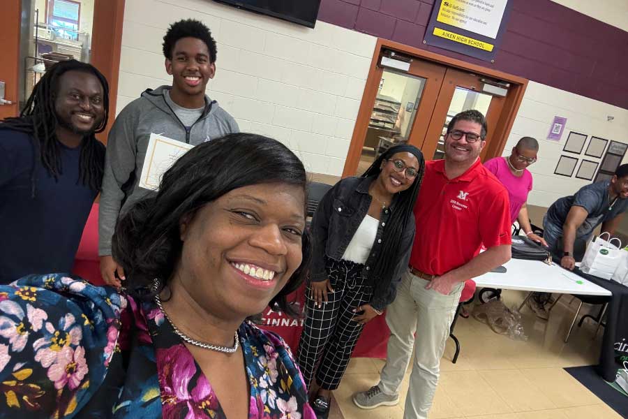 Lakisha Zyyon, Prince Johnson, Camerin Scott, Syndnie Singleton, and Brian Schultz pose together for a picture