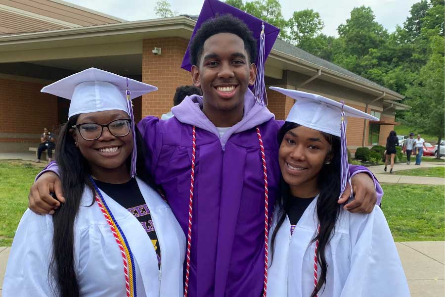 Aiken High School graduates who are part of the TEACh program wearing their graduation regalia and their Miami University/TEACh Cincinnati cords. From left to right: Jada Martin-Showes, Camerin Scott, Sky Whaley.
