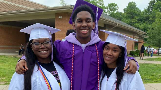 Aiken High School graduates who are part of the TEACh program wearing their graduation regalia and their Miami University/TEACh Cincinnati cords. From left to right: Jada Martin-Showes, Camerin Scott, Sky Whaley.