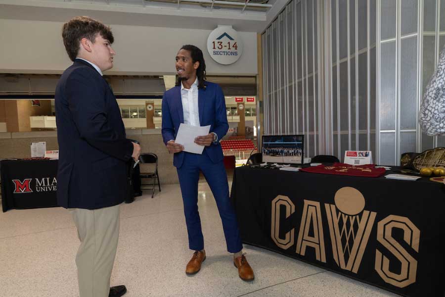 Miami University student networks with Cleveland Cavaliers representative at the 2025 Sport Career Exploration and Networking Expo.