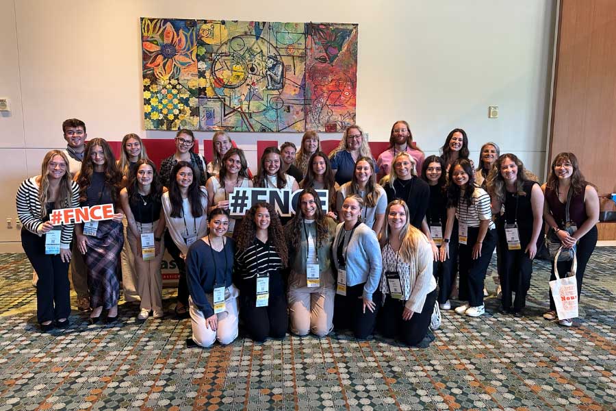 Miami nutrition students and alumni in the Music Hall Center in Nashville