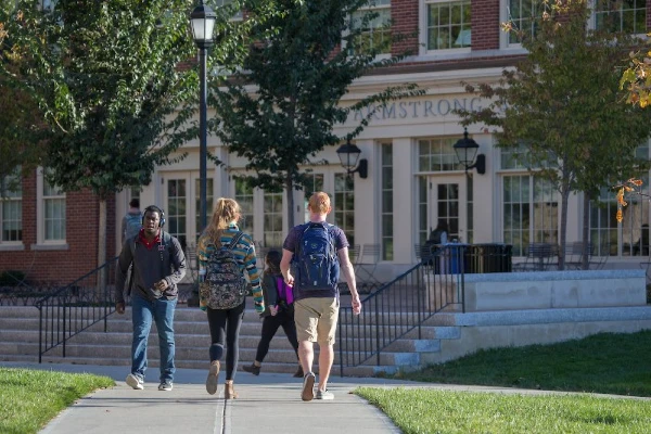 students walking in front of Armstrong Student Center in the summer