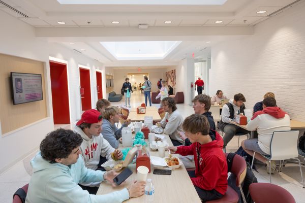students eating at a table at Bell Tower