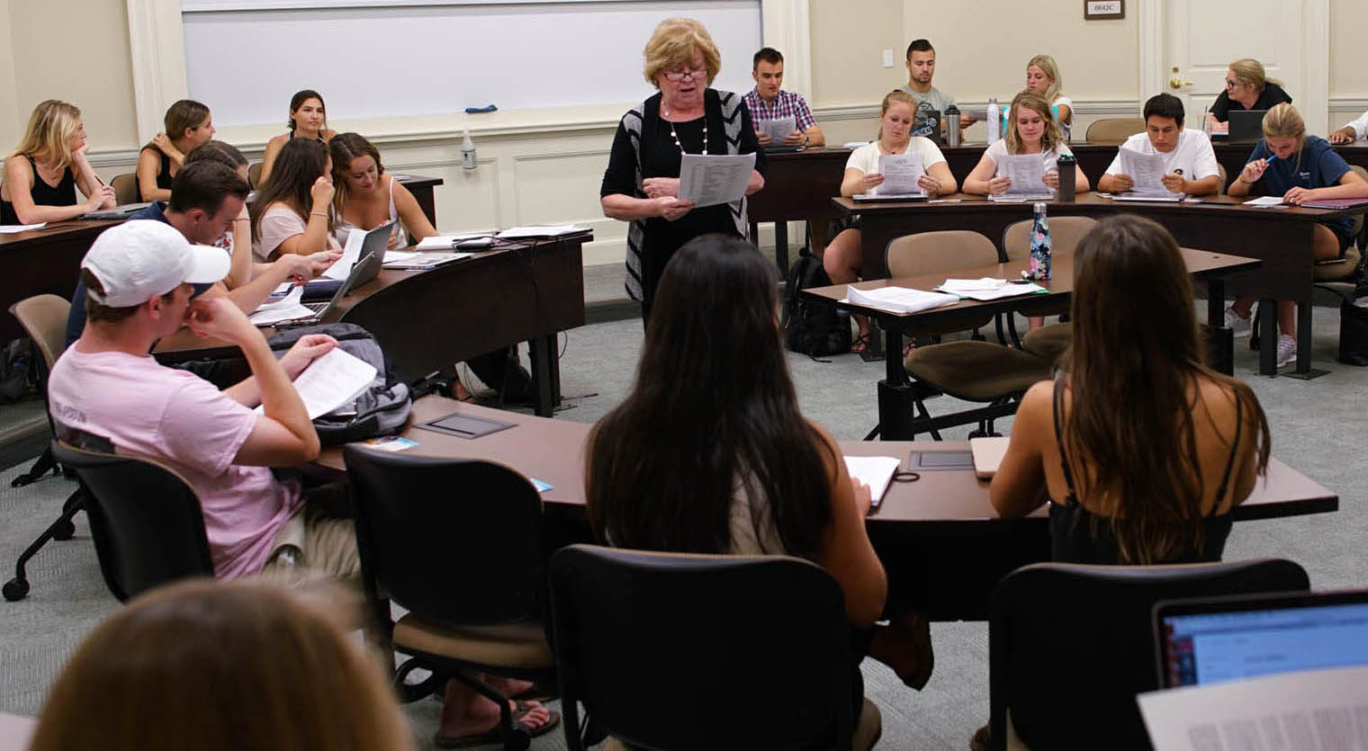 Jan Taylor talks to students during the first day of classes