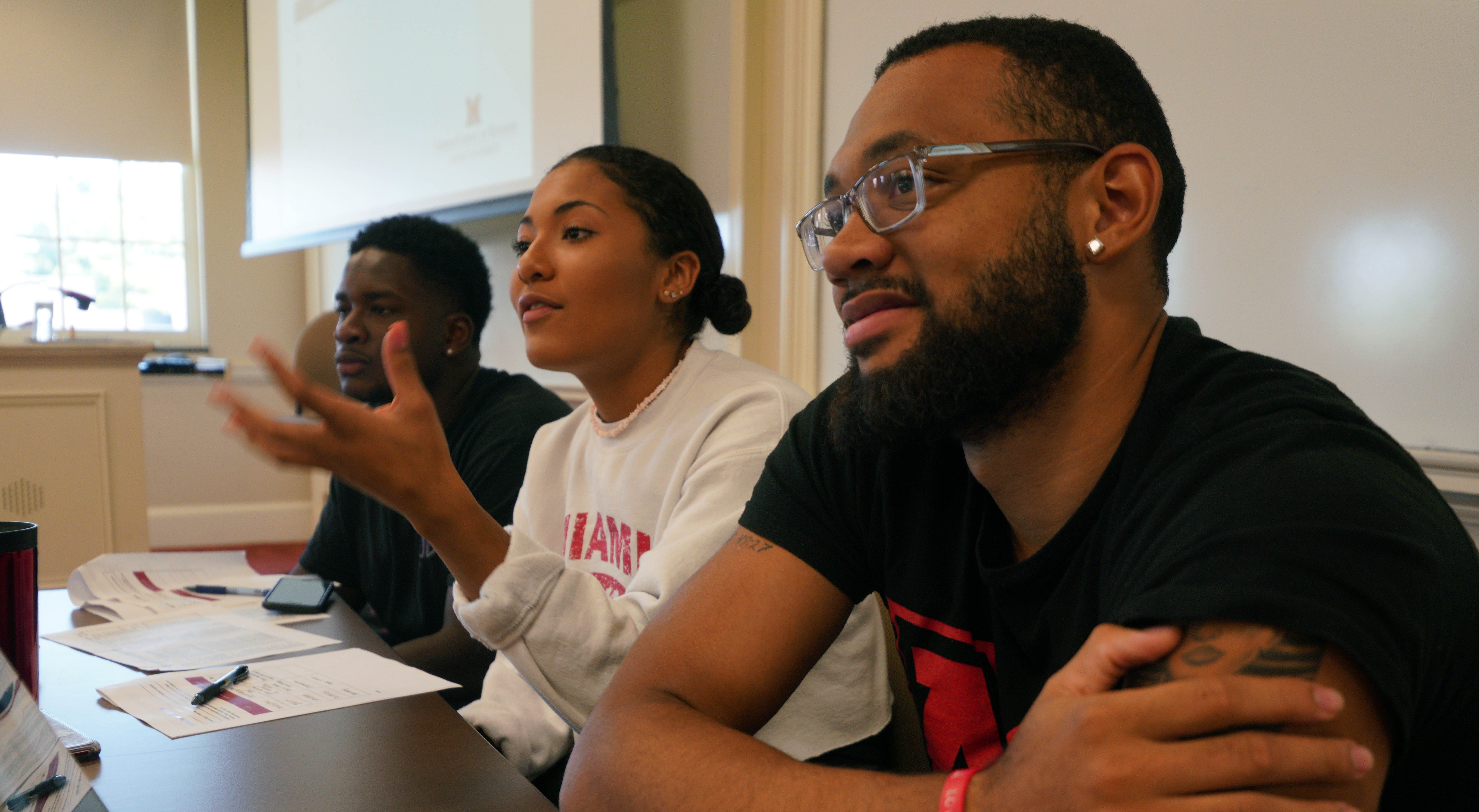 Mentor Makayla Archer talks to the students about her experiences