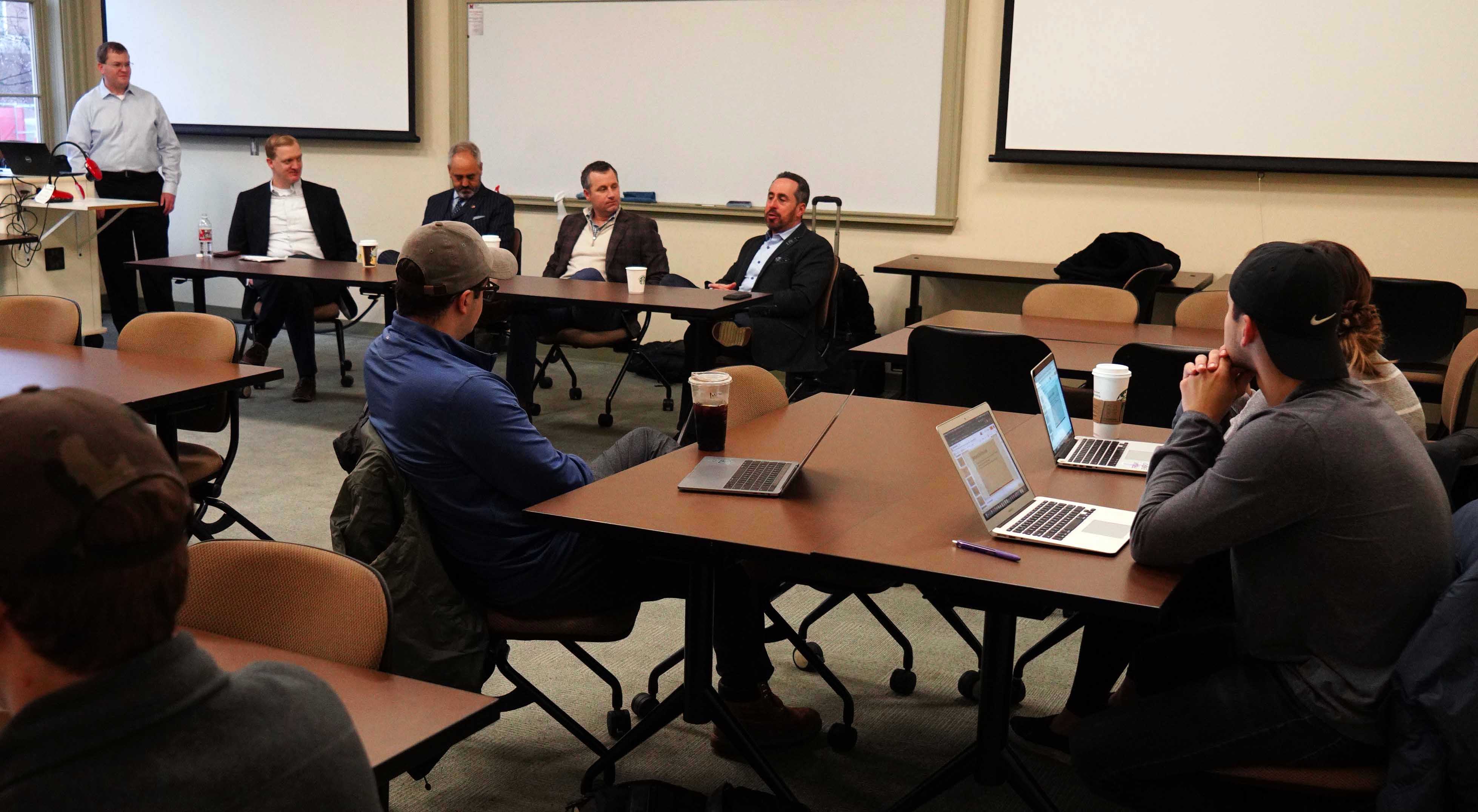 Real estate professionals talk to a Marketing 495 class