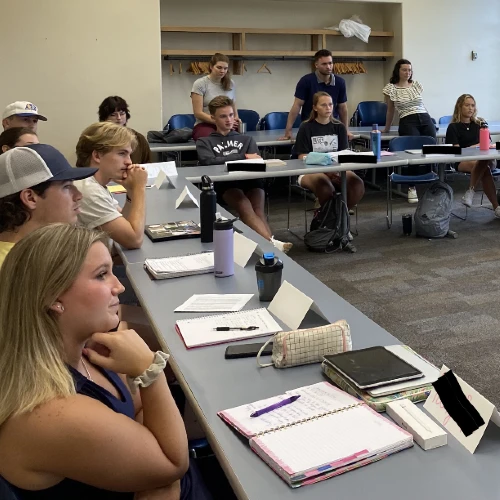 life students in classroom listening to a speaker 