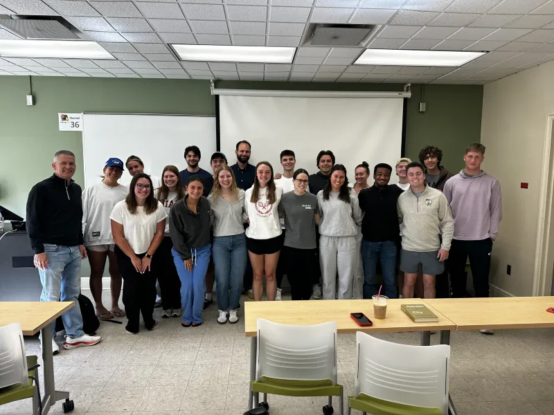 brett smith with students in classroom