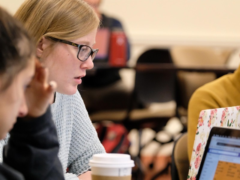 female student talking to classmate