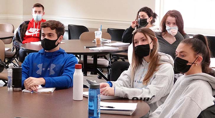 Students in class wearing masks
