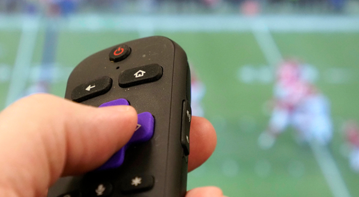TV remote pointing at the TV 