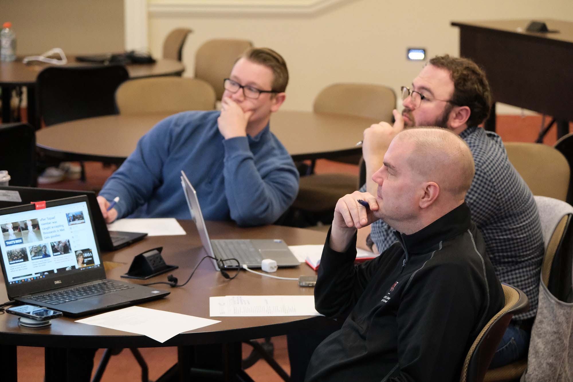 Terillium executives watch a presentation