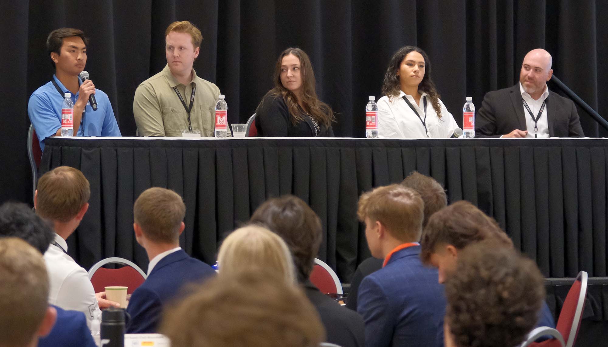 Panelists at a table