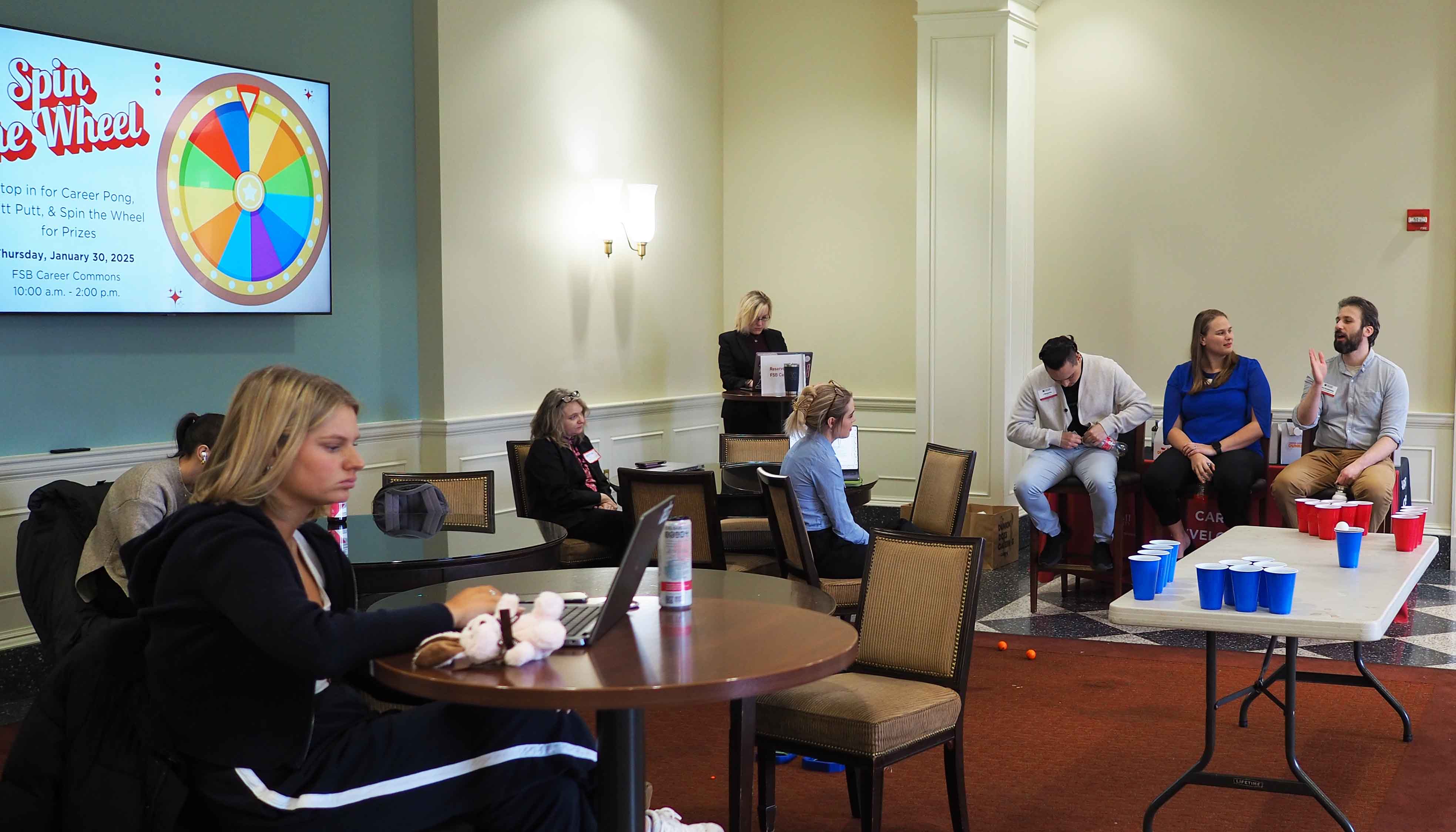 An advising panel fields questions from students