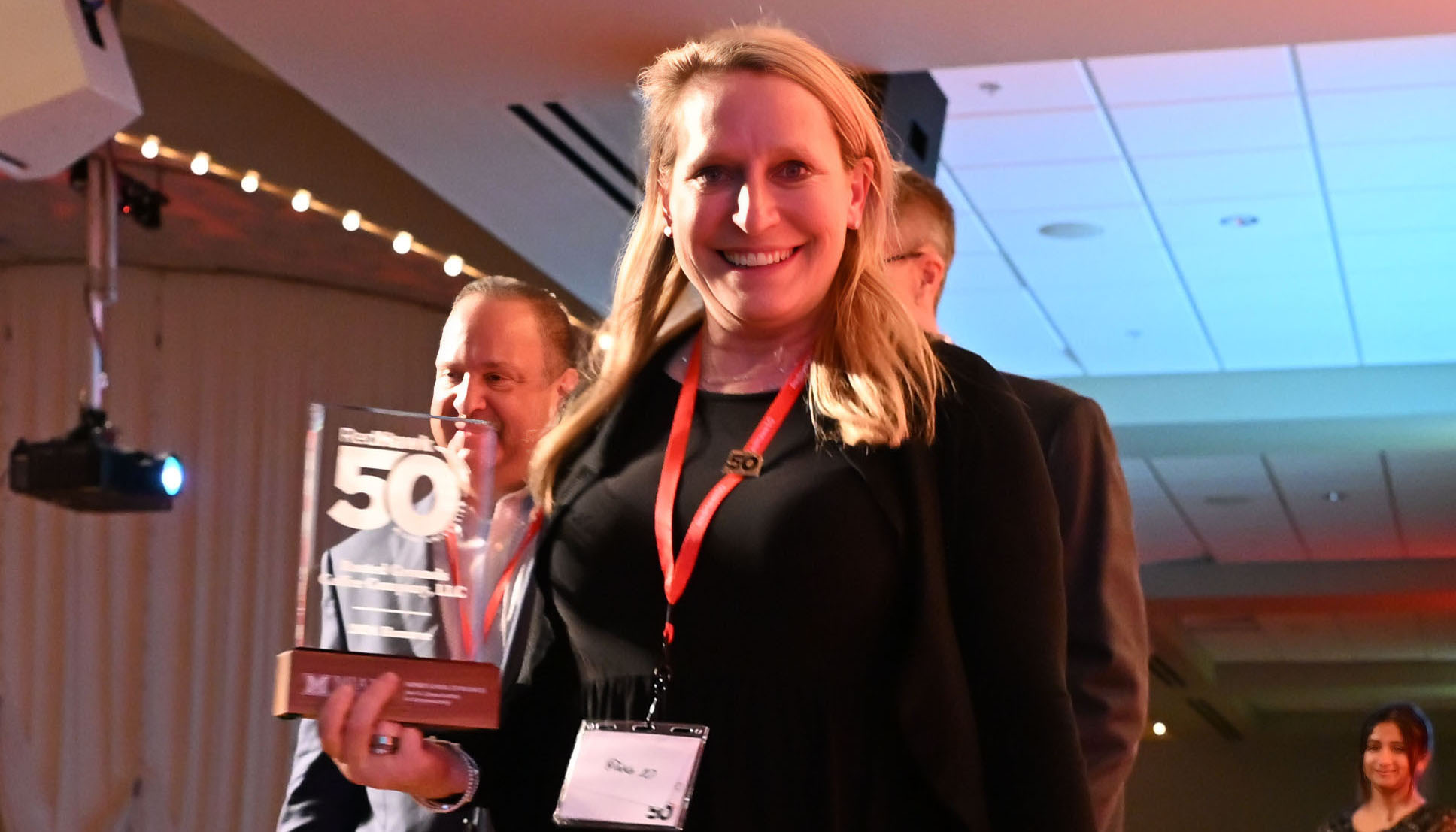 Recipient with award