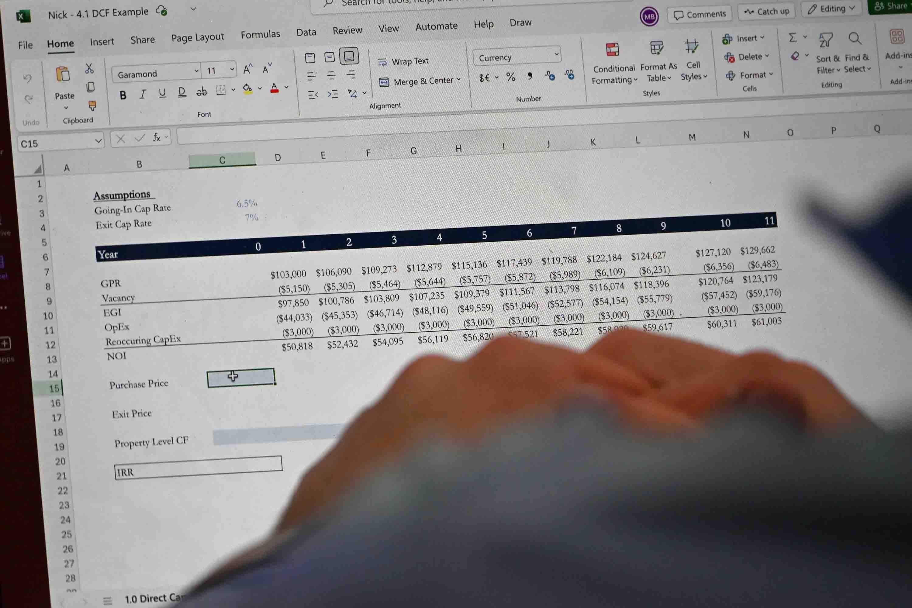 Computer screen with spreadsheet on it