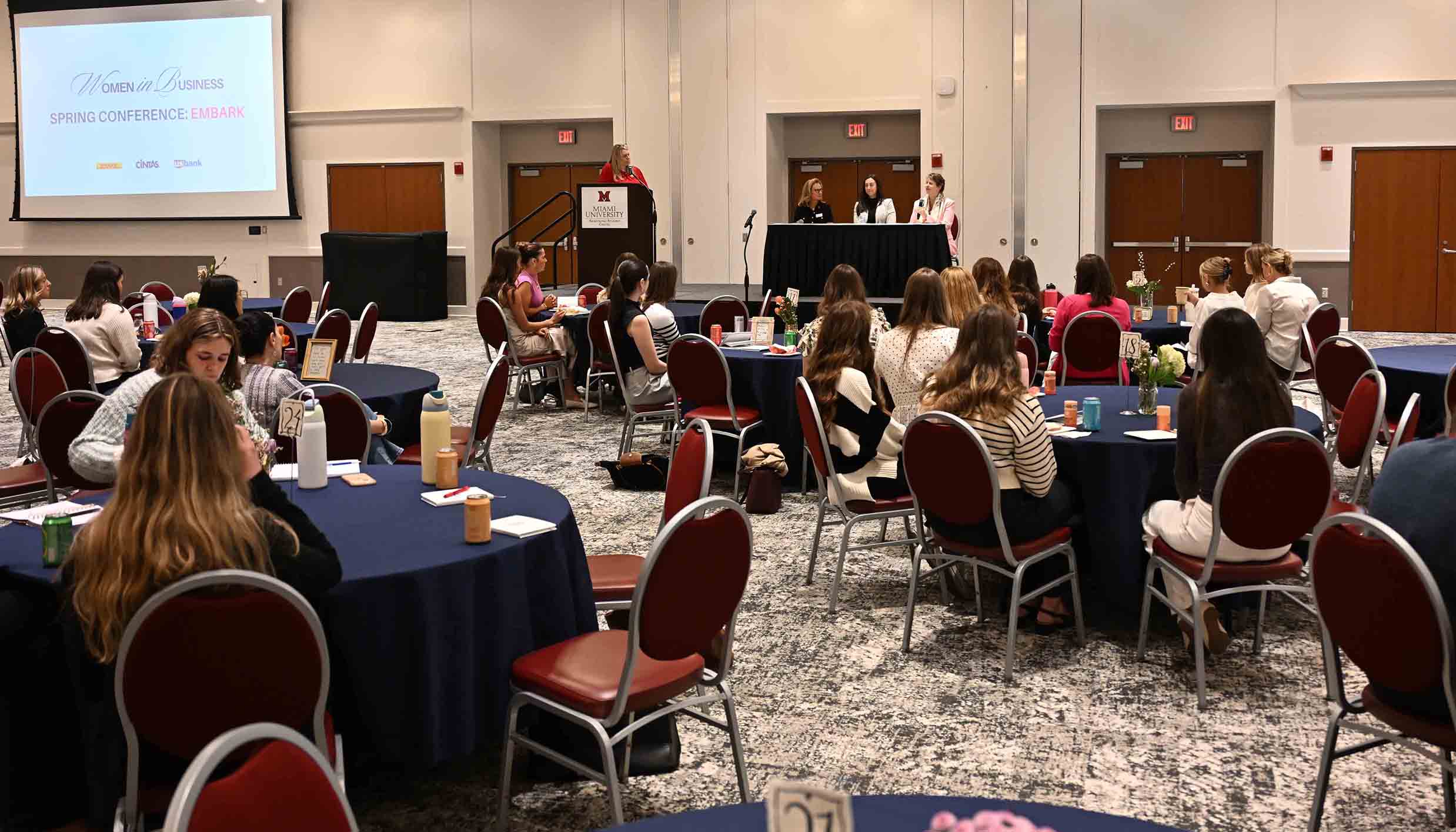Panel discussion in front of attendees