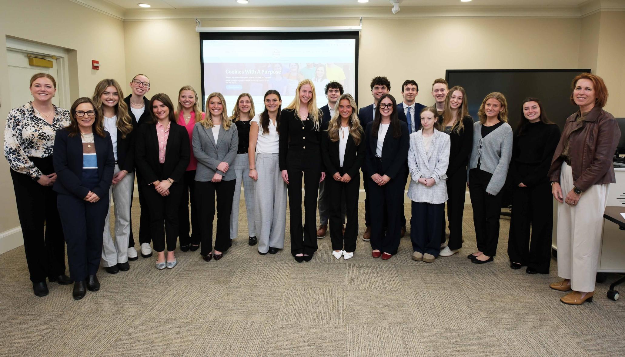 Group photo of clients and students