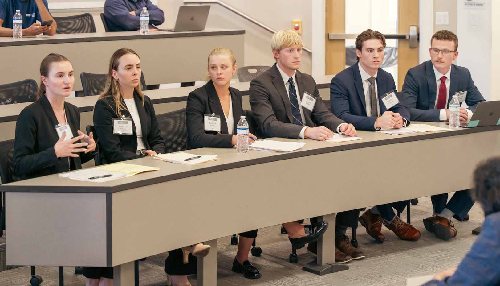 FSB team in competition sitting at table