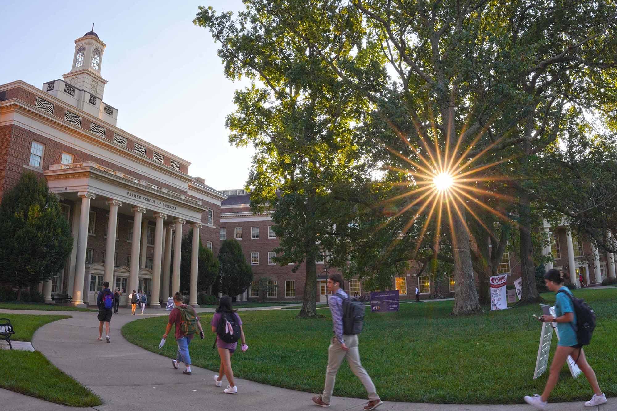Farmer School morning exterior photo with sunburst