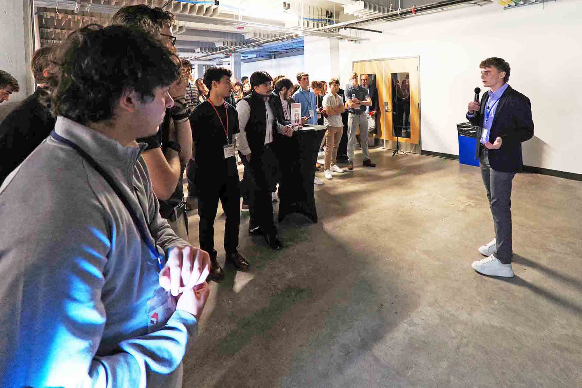 Student founder pitches product idea to attendees