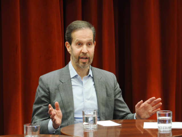 Ken Melhman speaking to students