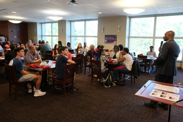 discover u students in classroom listening to presentation