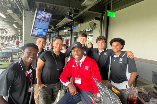 passport student group and leader at top golf 