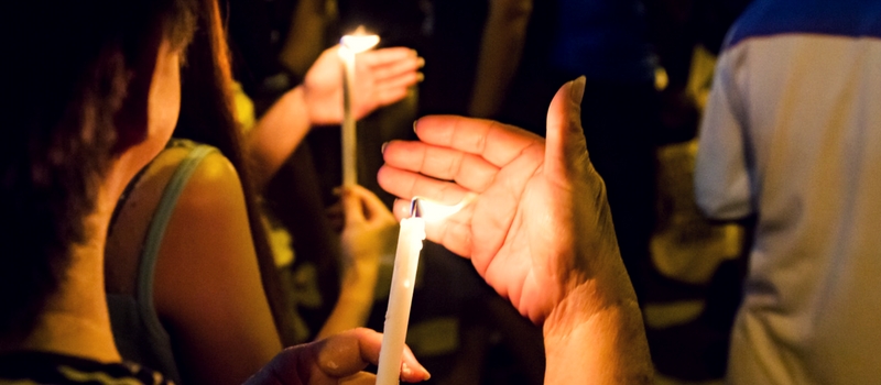 Person holding candle