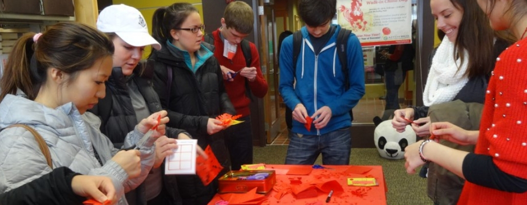 past students making Chinese paper of art crafts