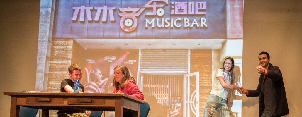 four Miami students on stage performing in the annual skit competition
