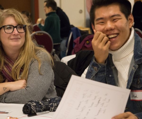 student smiling at Thanksgiving Dinner in 2017