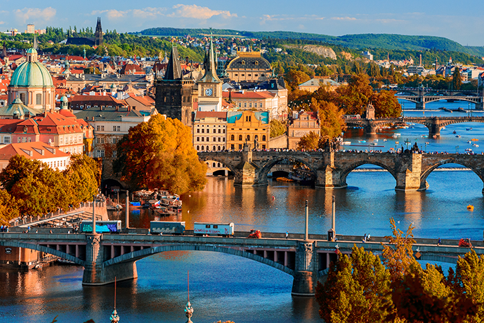 View of Prague with river, bridges, and buildings