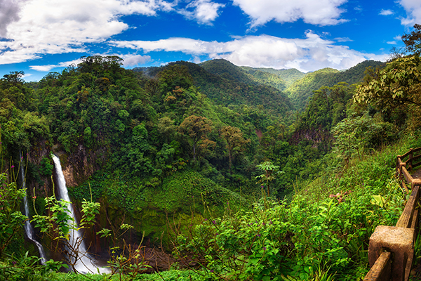 Waterfall and lush mountainsides in Costa Rica