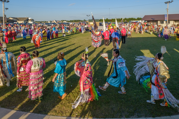 Dancers in colorful clothing dance in Miami Oklahoma