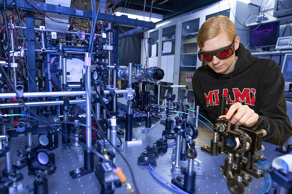 student working on quantum computer