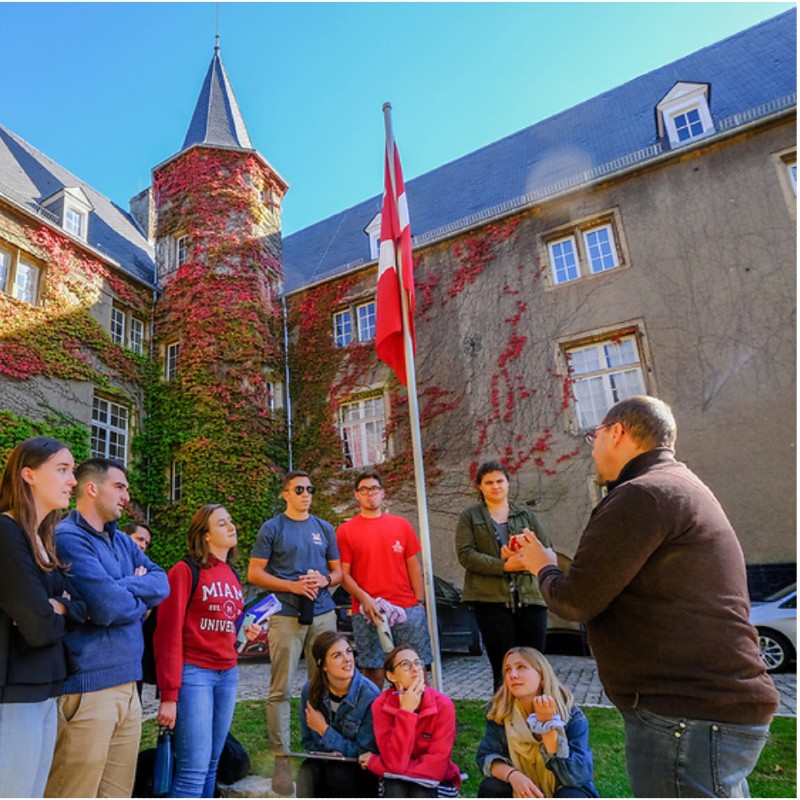 Students outside of chateau in Luxembourg