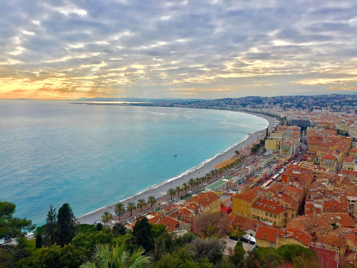 view of European city featuring its extended coastline and beach