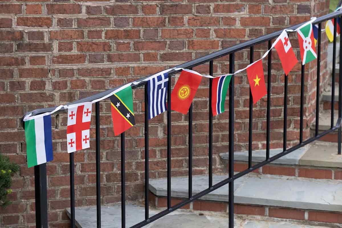 a banner of flags from a number of countries